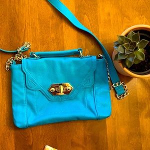 Steve Madden Aqua and gold chain leather never used perfect condition!